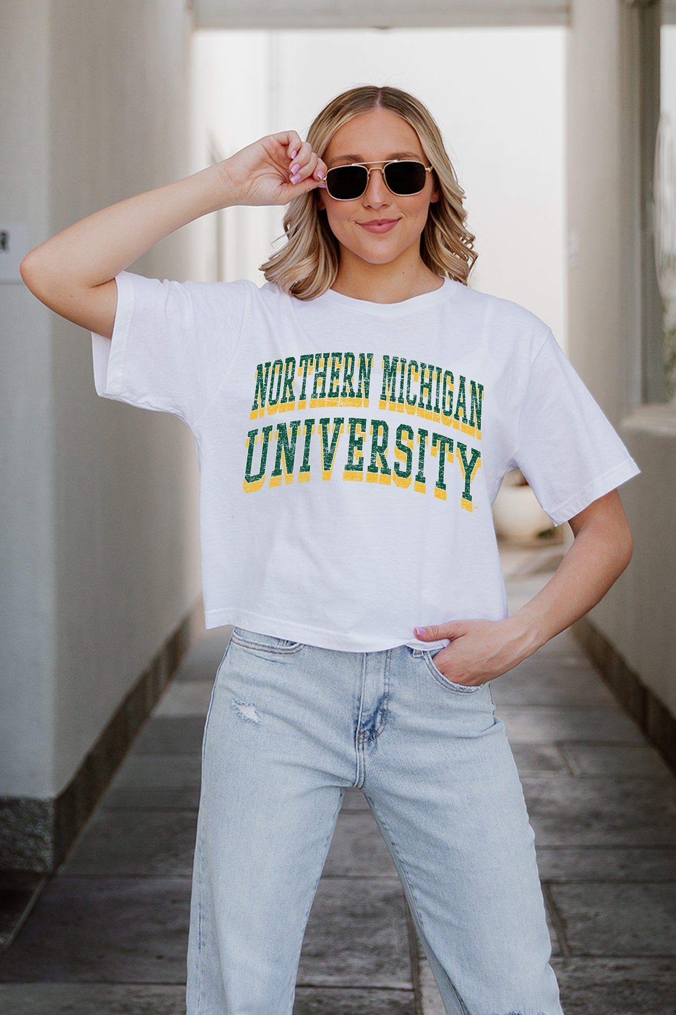 NORTHERN MICHIGAN WILDCATS CLAIM TO FAME BOXY FIT WOMEN'S CROPPED TEE