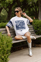 TENNESSEE TITANS CROWD PLEASER VINTAGE LOOK SHORT SLEEVE SPORTS STRIPE RAGLAN TEE