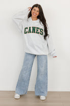 MIAMI HURRICANES WINNING LOOK OVERSIZED PREMIUM WEIGHT HOODIE BY MADI PREWETT TROUTT