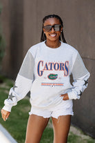 FLORIDA GATORS SHINING SPIRIT CREWNECK FLEECE WITH JERSEY MESH CONTRASTING SHOULDER INSERT AND RIBBED CUFFS AND WAISTBAND