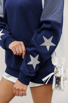 GEORGE WASHINGTON REVOLUTIONARIES SHINING SPIRIT CREWNECK FLEECE WITH JERSEY MESH CONTRASTING SHOULDER INSERT AND RIBBED CUFFS AND WAISTBAND