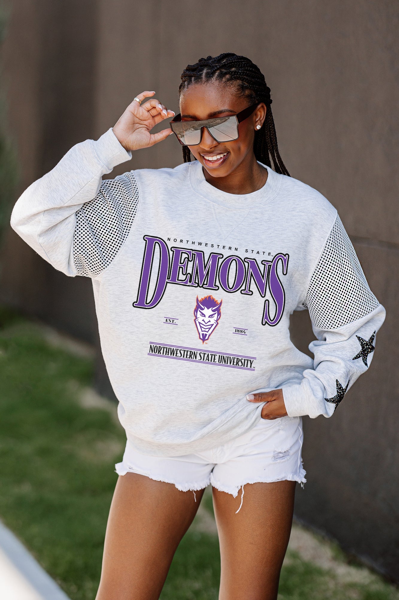 NORTHWESTERN STATE DEMONS SHINING SPIRIT CREWNECK FLEECE WITH JERSEY MESH CONTRASTING SHOULDER INSERT AND RIBBED CUFFS AND WAISTBAND