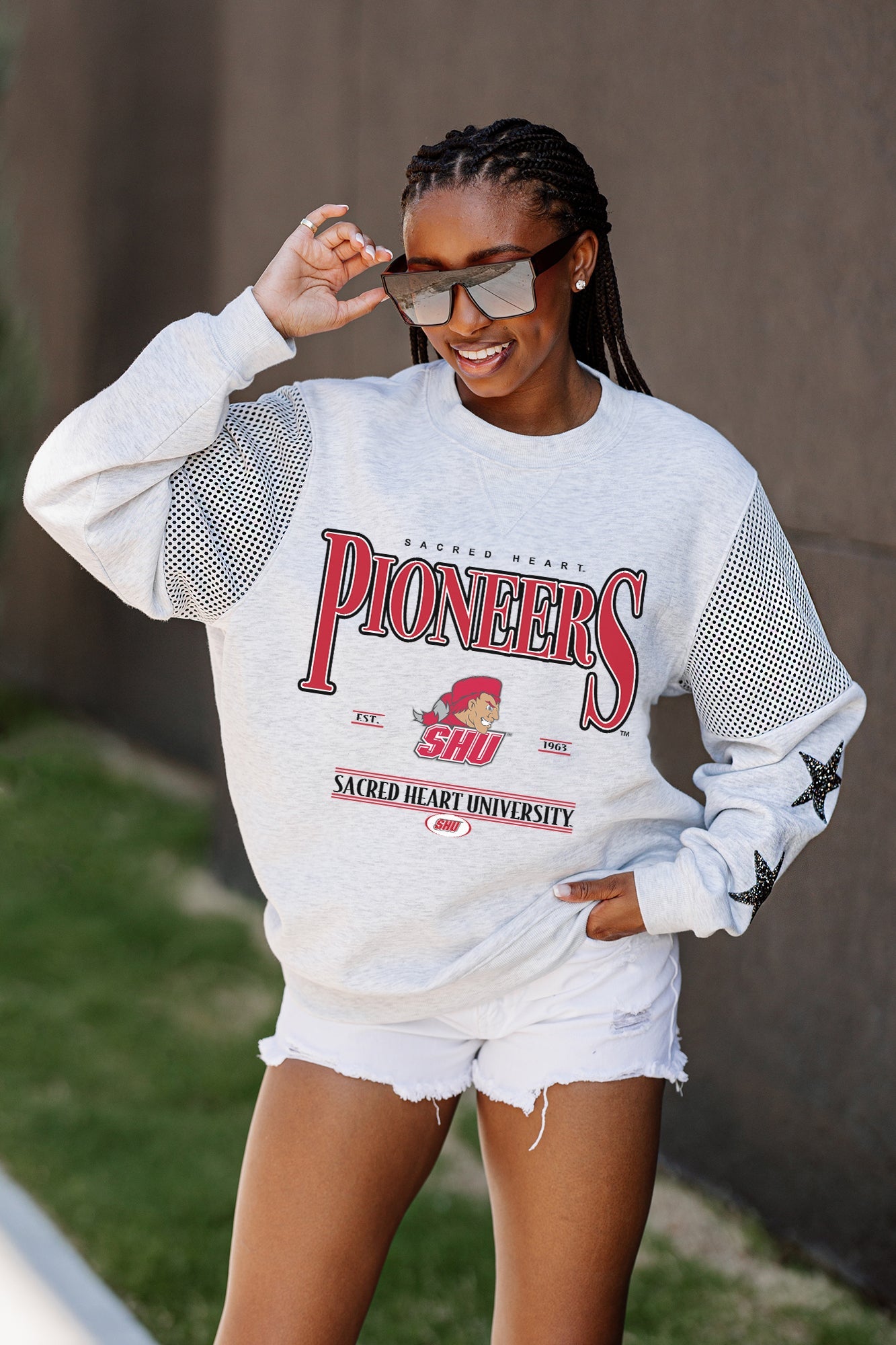 SACRED HEART PIONEERS SHINING SPIRIT CREWNECK FLEECE WITH JERSEY MESH CONTRASTING SHOULDER INSERT AND RIBBED CUFFS AND WAISTBAND