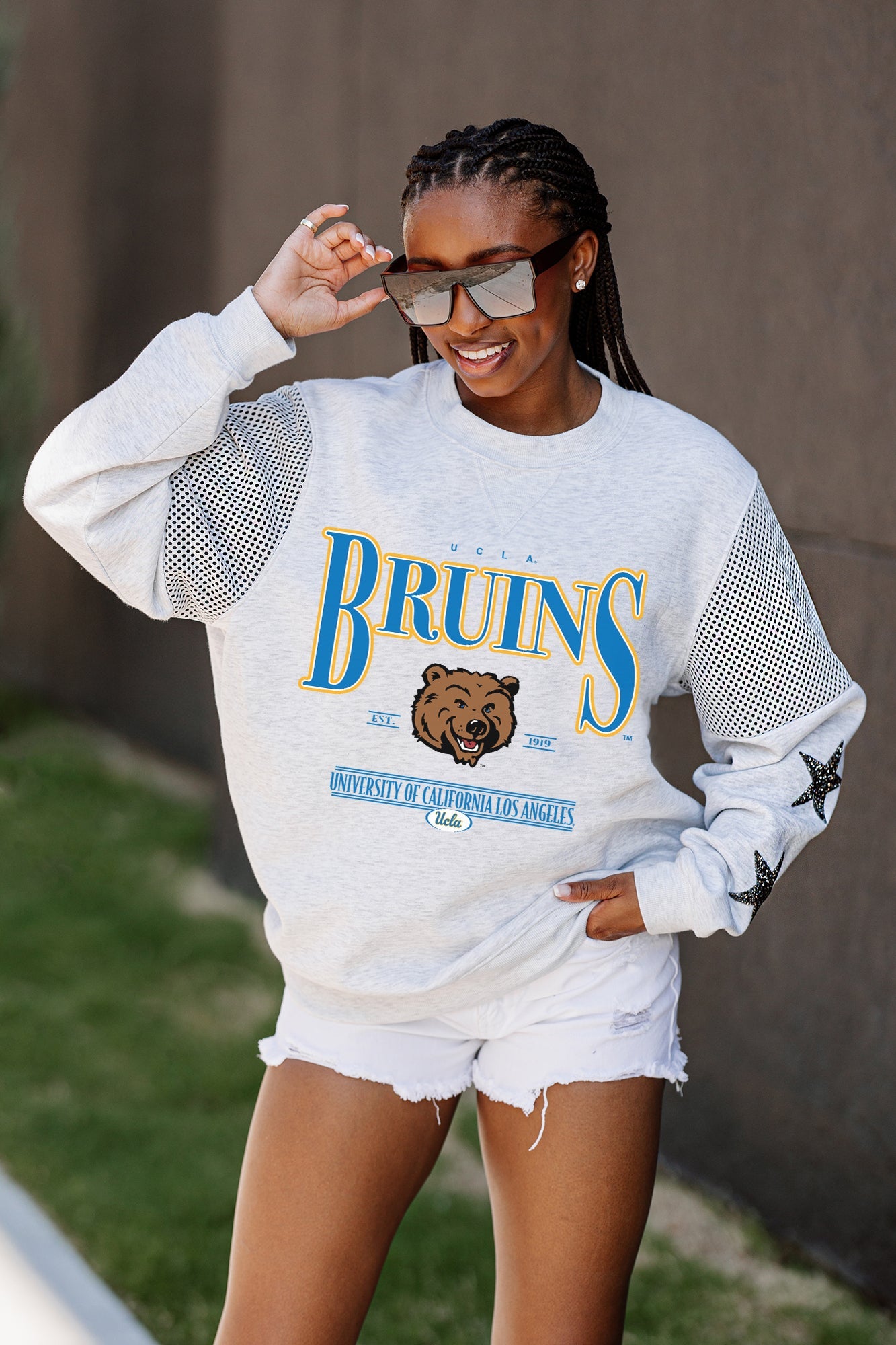 UCLA BRUINS SHINING SPIRIT CREWNECK FLEECE WITH JERSEY MESH CONTRASTING SHOULDER INSERT AND RIBBED CUFFS AND WAISTBAND