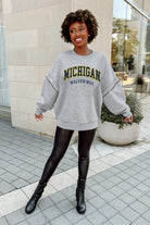 MICHIGAN WOLVERINES COMPETITIVE EDGE FLEECE PULLOVER WITH JEWEL SLEEVE EMBELLISHMENTS