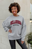 OKLAHOMA SOONERS COMPETITIVE EDGE FLEECE PULLOVER WITH JEWEL SLEEVE EMBELLISHMENTS