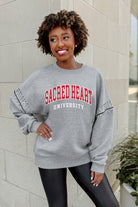 SACRED HEART PIONEERS COMPETITIVE EDGE FLEECE PULLOVER WITH JEWEL SLEEVE EMBELLISHMENTS