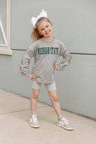 MICHIGAN STATE SPARTANS GUESS WHO'S BACK KIDS SEQUIN YOKE PULLOVER