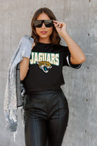 JACKSONVILLE JAGUARS AUTOMATIC DOWN LIGHTWEIGHT SPORTY TOP WITH STRIPED SLEEVE DETAIL