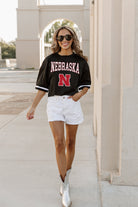 NEBRASKA CORNHUSKERS SCORE SQUAD MODERATE FIT FASHION JERSEY BY MADI PREWETT