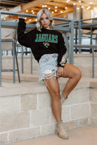 JACKSONVILLE JAGUARS GAMEDAY GLITZ LONG SLEEVE TEE WITH SEQUIN TRIM BACK AND SLEEVE DETAIL