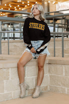 PITTSBURGH STEELERS GAMEDAY GLITZ LONG SLEEVE TEE WITH SEQUIN TRIM BACK AND SLEEVE DETAIL