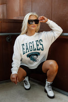 PHILADELPHIA EAGLES YARD LINE LONG SLEEVE FLEECE CREWNECK SWEATSHIRT WITH RIBBED KNIT COLLAR, WRIST, AND WAISTBAND