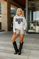 LAS VEGAS RAIDERS SIDELINE HOODED LEOPARD FLEECE PULLOVER WITH FRONT POCKET AND SIDE-SLIT DETAIL