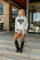 LAS VEGAS RAIDERS SIDELINE HOODED LEOPARD FLEECE PULLOVER WITH FRONT POCKET AND SIDE-SLIT DETAIL