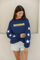 MICHIGAN WOLVERINES SIX STARS EMBELLISHED SLEEVE CREWNECK PULLOVER BY MADI PREWETT TROUTT